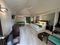 Komfortables Zimmer im Adaaran Select Hudhuran Fushi auf den Malediven – Unterkunft für Teilnehmende des Kompaktkurses Tauchmedizin 2026